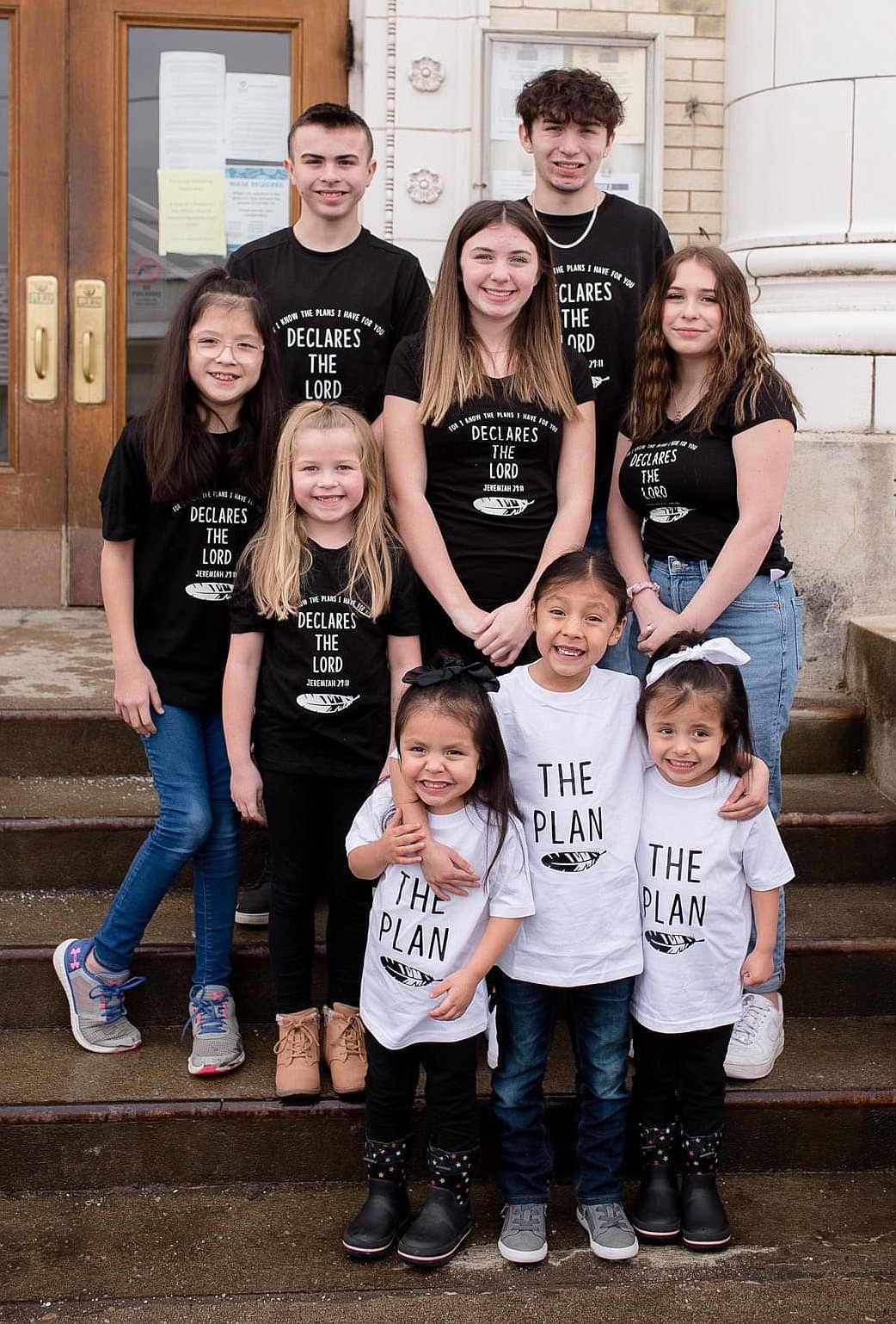 The Walker kids on the day of the adoption of Jeremiah, Miya and Aaliyah on Feb. 24. Back row, from left: Carter and Cade. Second row: Dakota, Sawyer, Kylee and Halle. Front row: Aaliyah, Jeremiah and Miya.