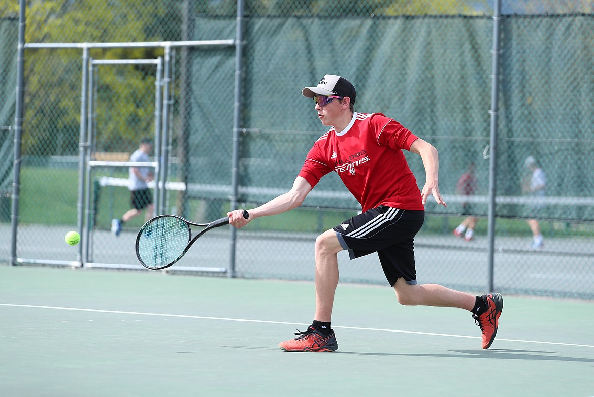 Tyler Korn gets down low to return a shot on Thursday.