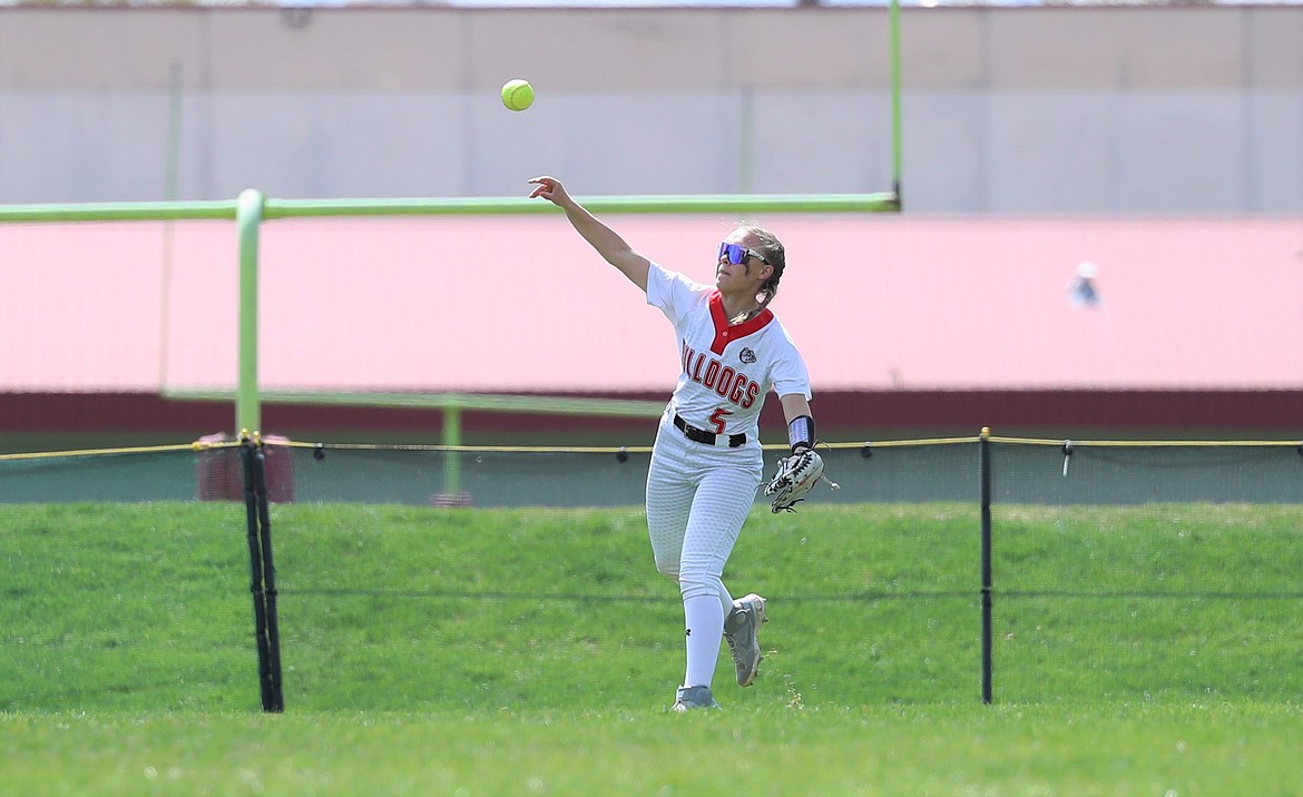 Jacey Cash makes a throw from center field on Saturday.