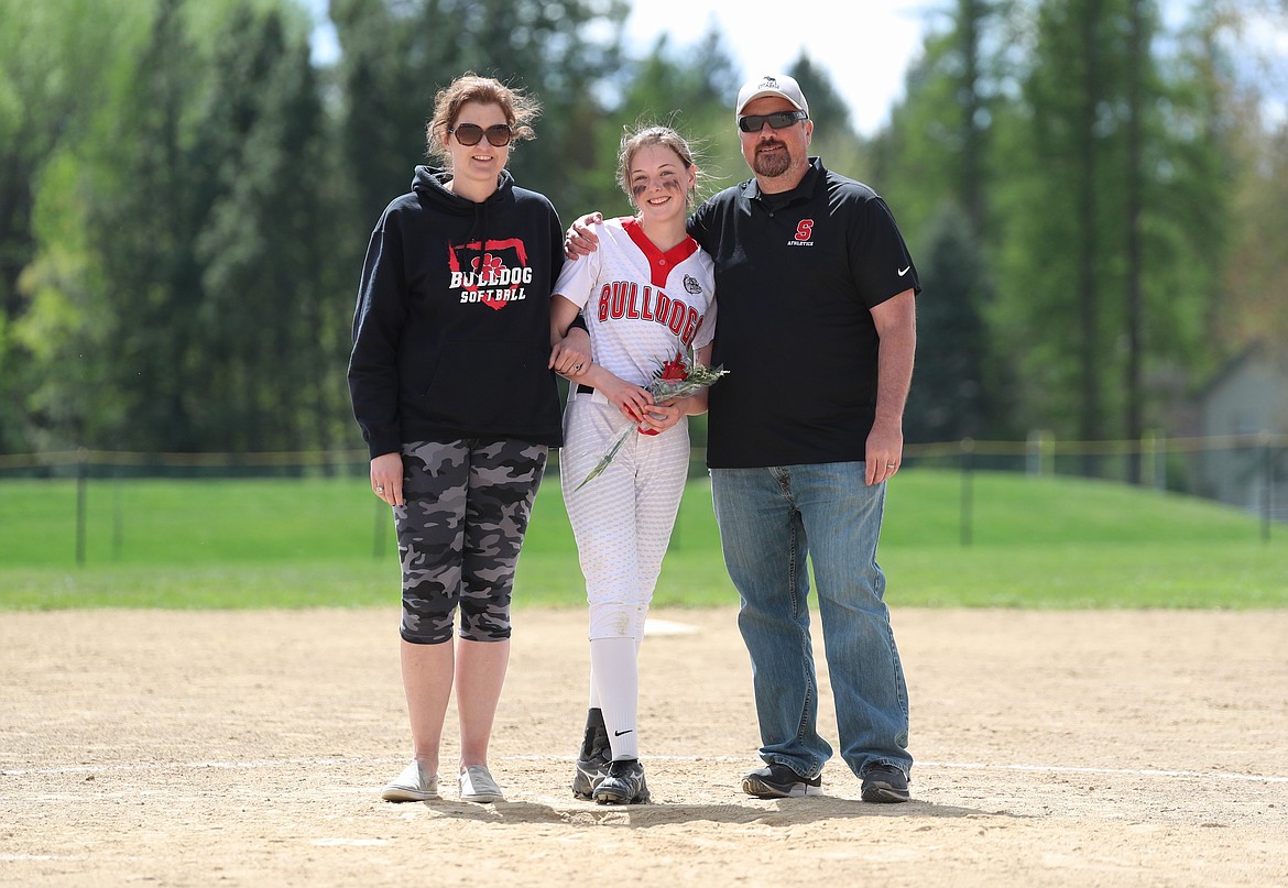 Jaden Dickinson celebrates Senior Night with her family.