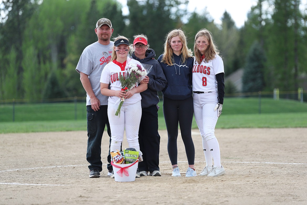 Riley Cessna celebrates Senior Night with her family.