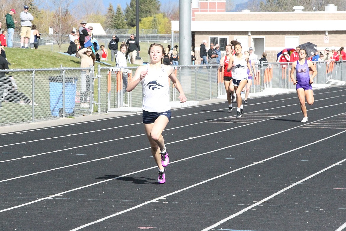 JASON ELLIOTT/Press
Lake City High senior Angelyca Chapman holds onto her lead in the final 50 meters of the 400-meter dash during the Christina Finney Relays on April 23 in Post Falls.