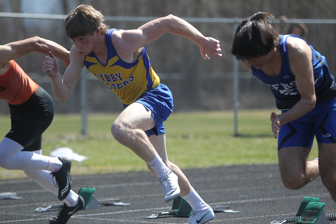 Libby’s Jay Beagle launches off the starting blocks in the 100-meter dash at the Libby Invite in Libby on April 17, 2021. (Will Langhorne/Western News)