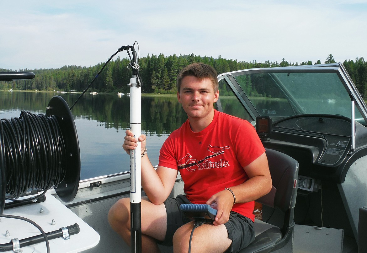 NMLN volunteer Zach Cook uses special equipment to collect samples on Beaver Lake. (Courtesy photo)