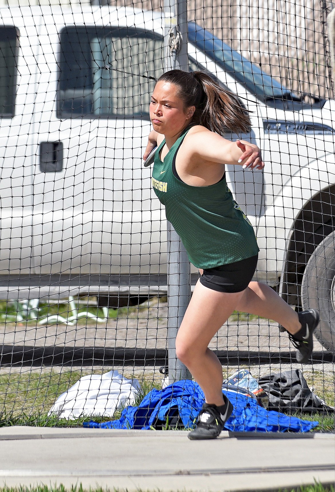 Lady Bulldog Jennifer Patten throws a personal best in the discus event at the Whitefish ARM meet on Saturday. (Whitney England/Whitefish Pilot)