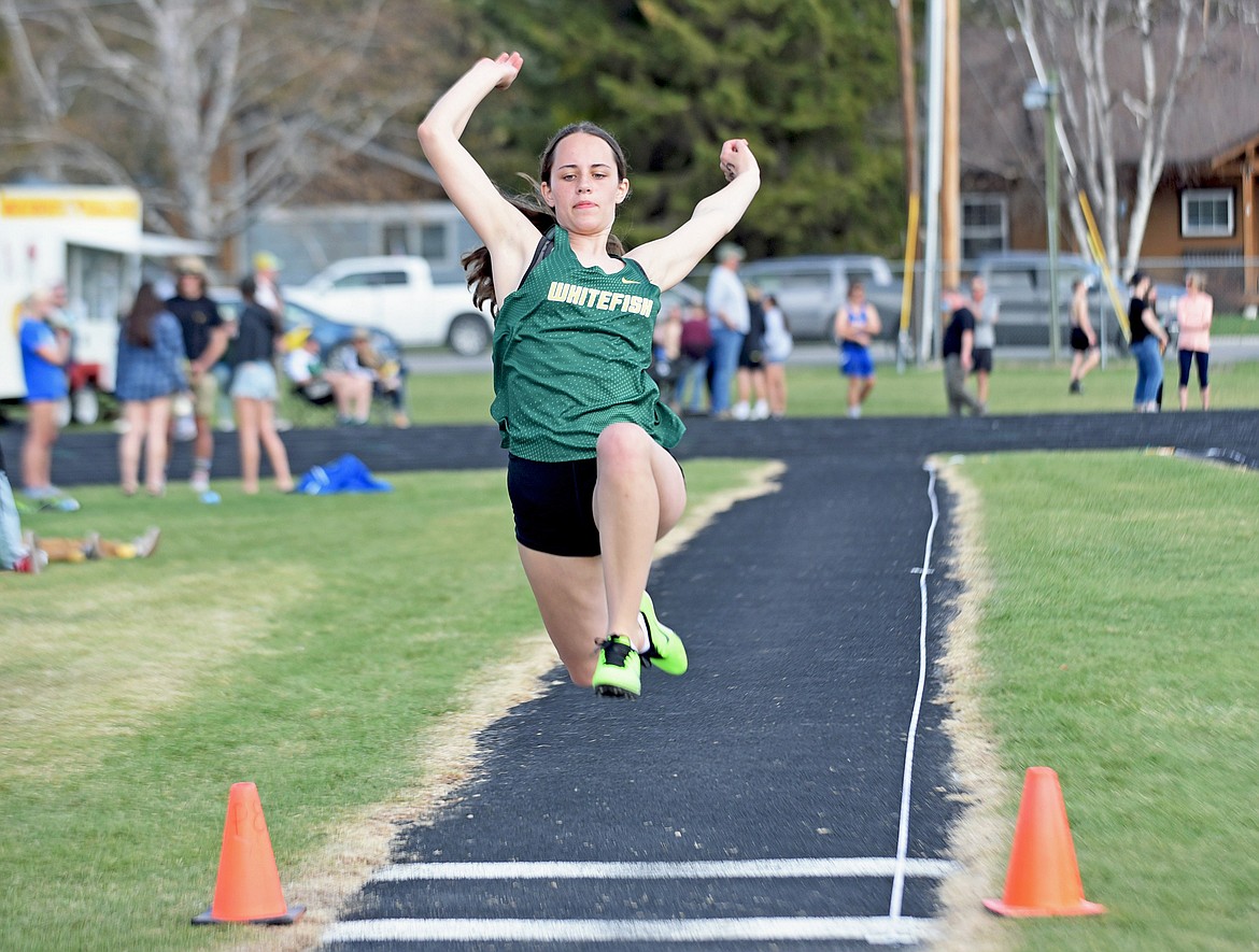 Whitefish's Maci Safir competes in the long jump at the Whitefish ARM meet on Saturday. (Whitney England/Whitefish Pilot)