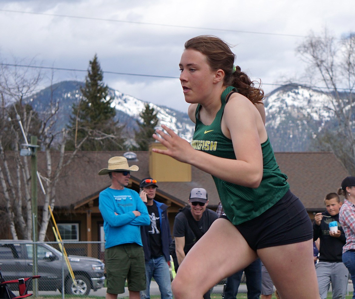 Whitefish sophomore Madelyn Alexander runs in the 400 meter dash Saturday at Whitefish High School. (Matt Weller photo)