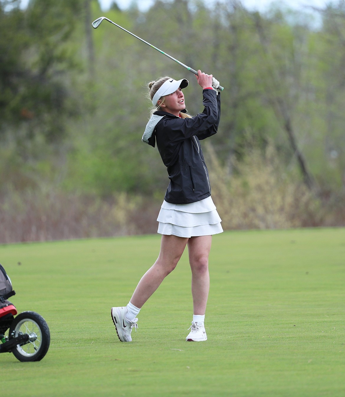 Annaby Kanning holds her follow through on a shot from the fairway on Monday.
