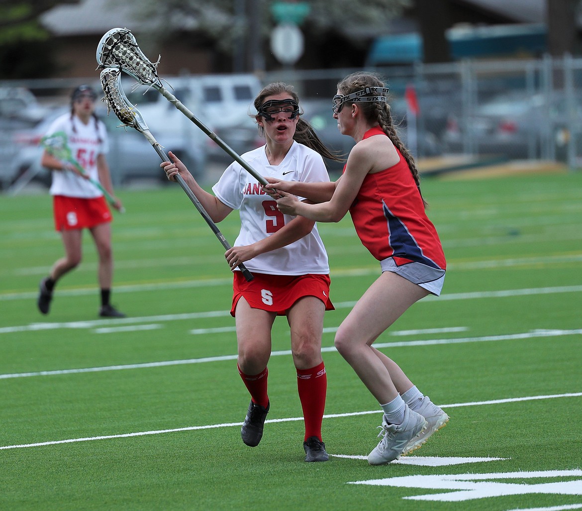 Audrey Anderson tries to fight past a defender on Saturday.