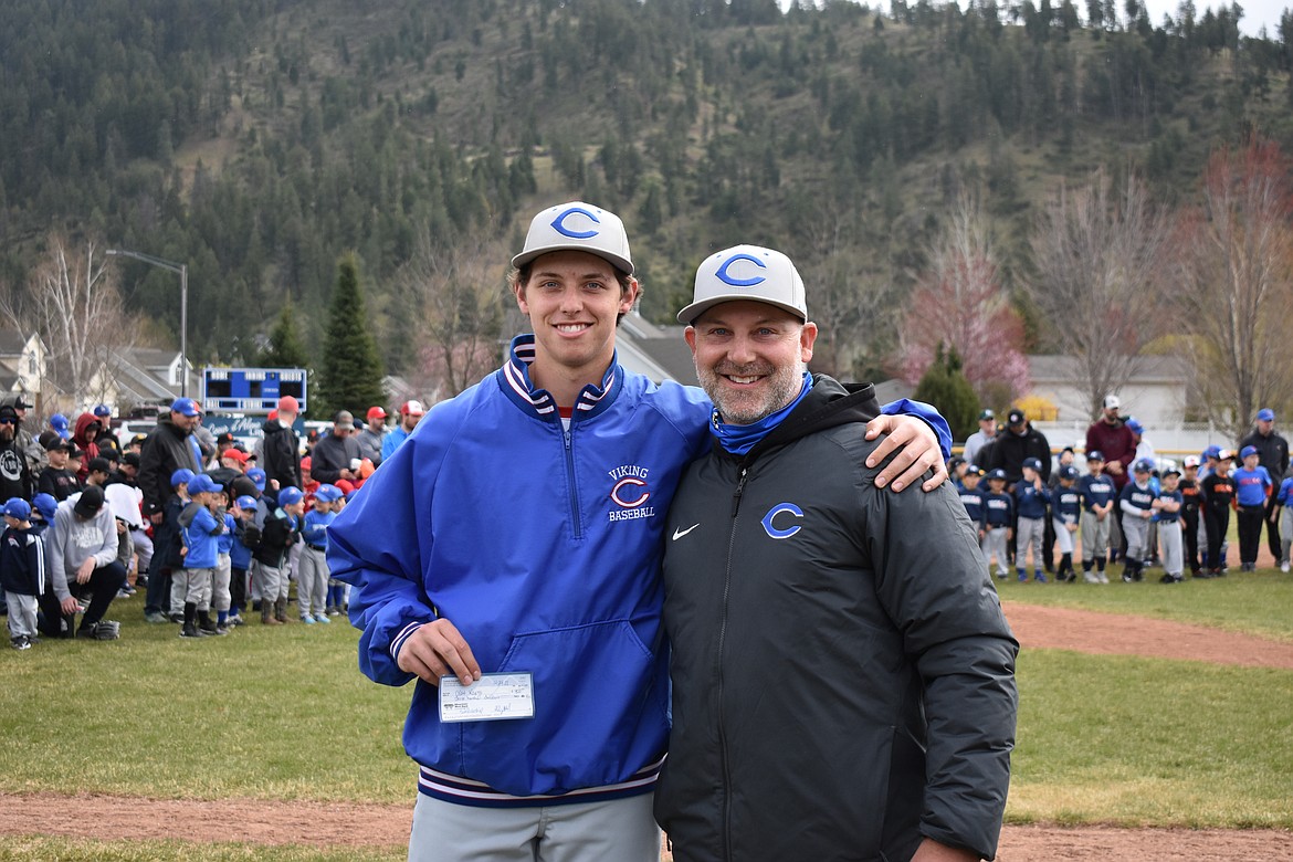 Alex Karns, left, of Coeur d'Alene High was one of two recipients of scholarships from Coeur d'Alene Little League, for seniors who are continuing their baseball career in college. Karns played for Coeur d'Alene Little League. At right is Erik Karns, dad. Not pictured is Rachel Karns, mom.