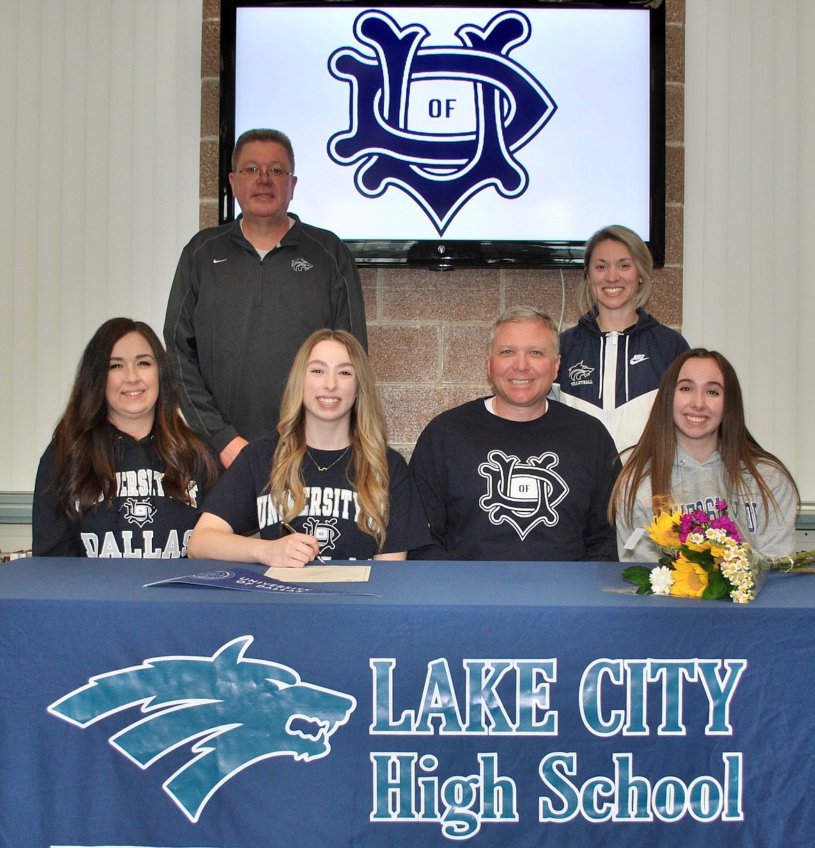 Courtesy photo
Lake City High senior Alissa Stennett recently signed a letter of intent to play volleyball at NCAA Division III University of Dallas in Irving, Texas. Seated from left is Amy Stennett (mom), Alissa Stennett, Jess Stennett (dad) and Aubrey Stennett (sister); and standing from left, Jim Winger, Lake City High athletic director; and Michelle Kleinberg, Lake City High volleyball coach.