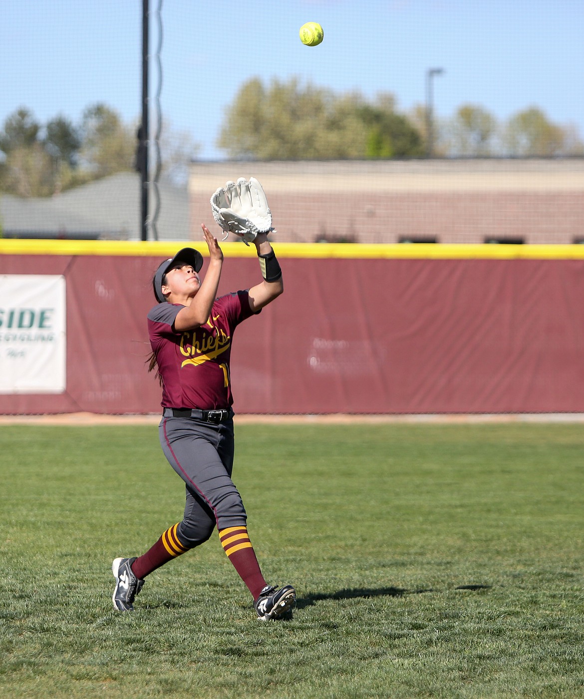 Jazlynn Torres makes the catch in left field for Moses Lake High School against Eastmont High School on Tuesday afternoon in Moses Lake.