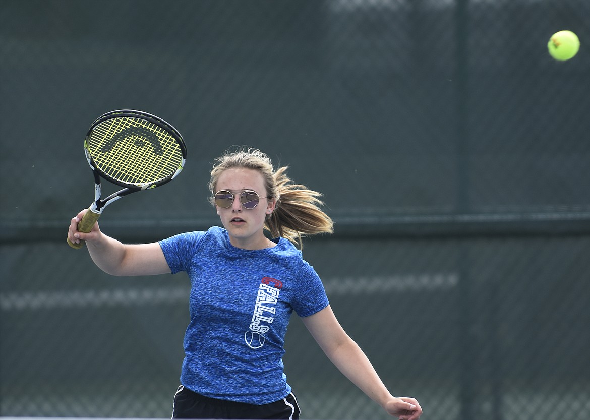 Columbia Falls’ Alyssa Williams returns a volley in a No. 2 doubles match against Whitefish at FVCC on Tuesday. (Teresa Byrd/Hungry Horse News)