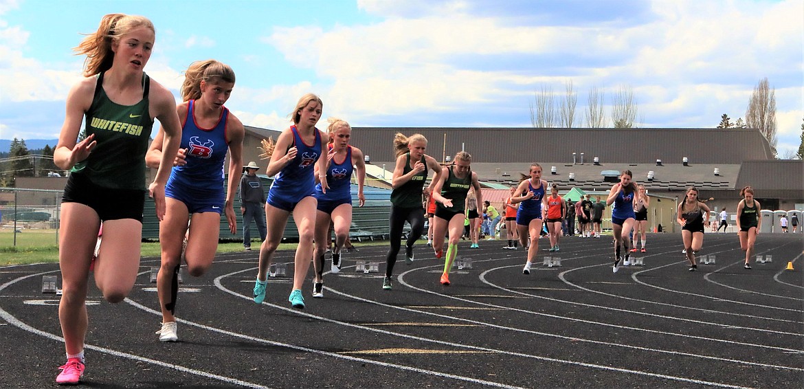 Runner take off during the 200 meter event at the Whitefish ARM meet on Saturday.
Courtesy Greg Nelson