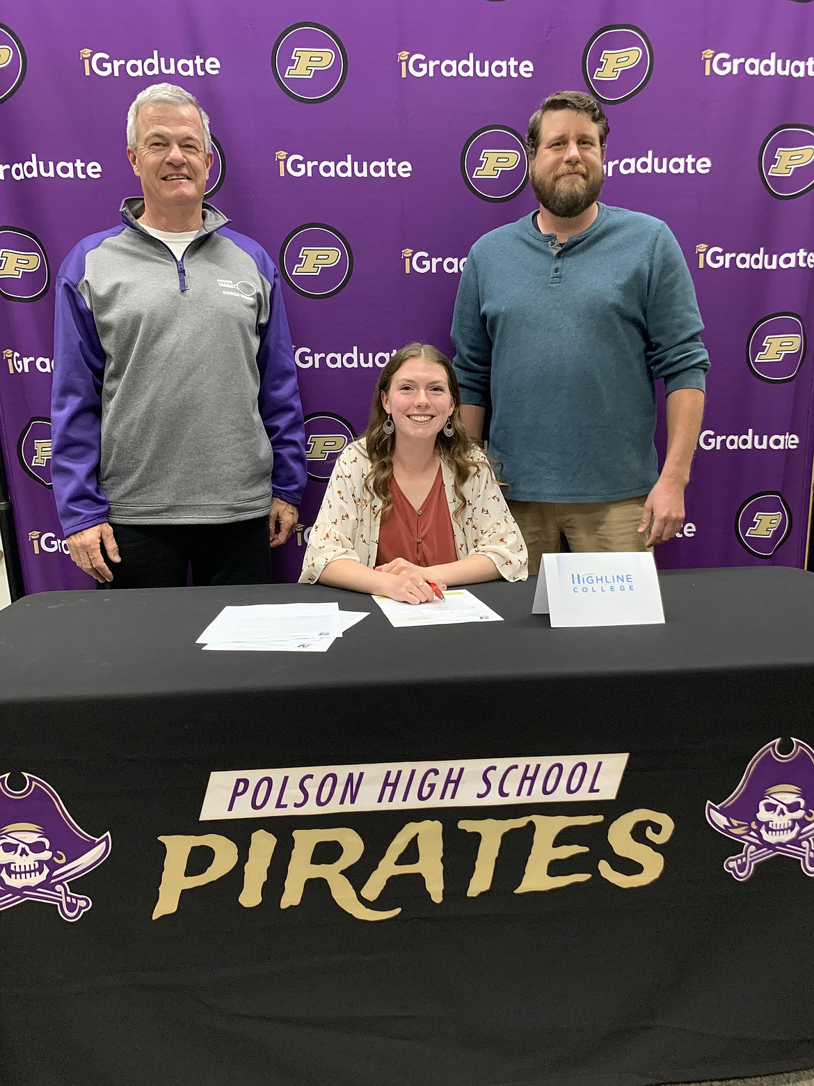 Megan Rost with Polson tennis coach Bob Hislop and her spring soccer coach, Jess Kittle, during a signing ceremony Aug. 26 at Polson High School. (Courtesy of Polson High School)