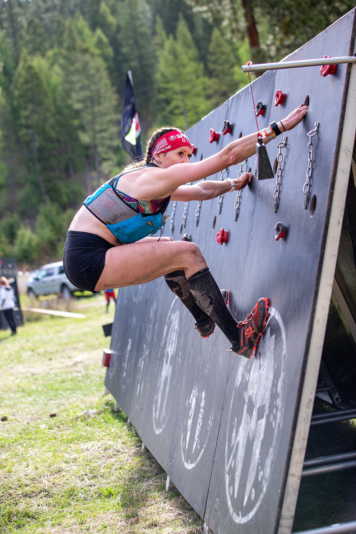 Kaci Monroe, of Bigfork, navigates the Olympus Wall obstacle.
Courtesy Mike Roessmann Photography