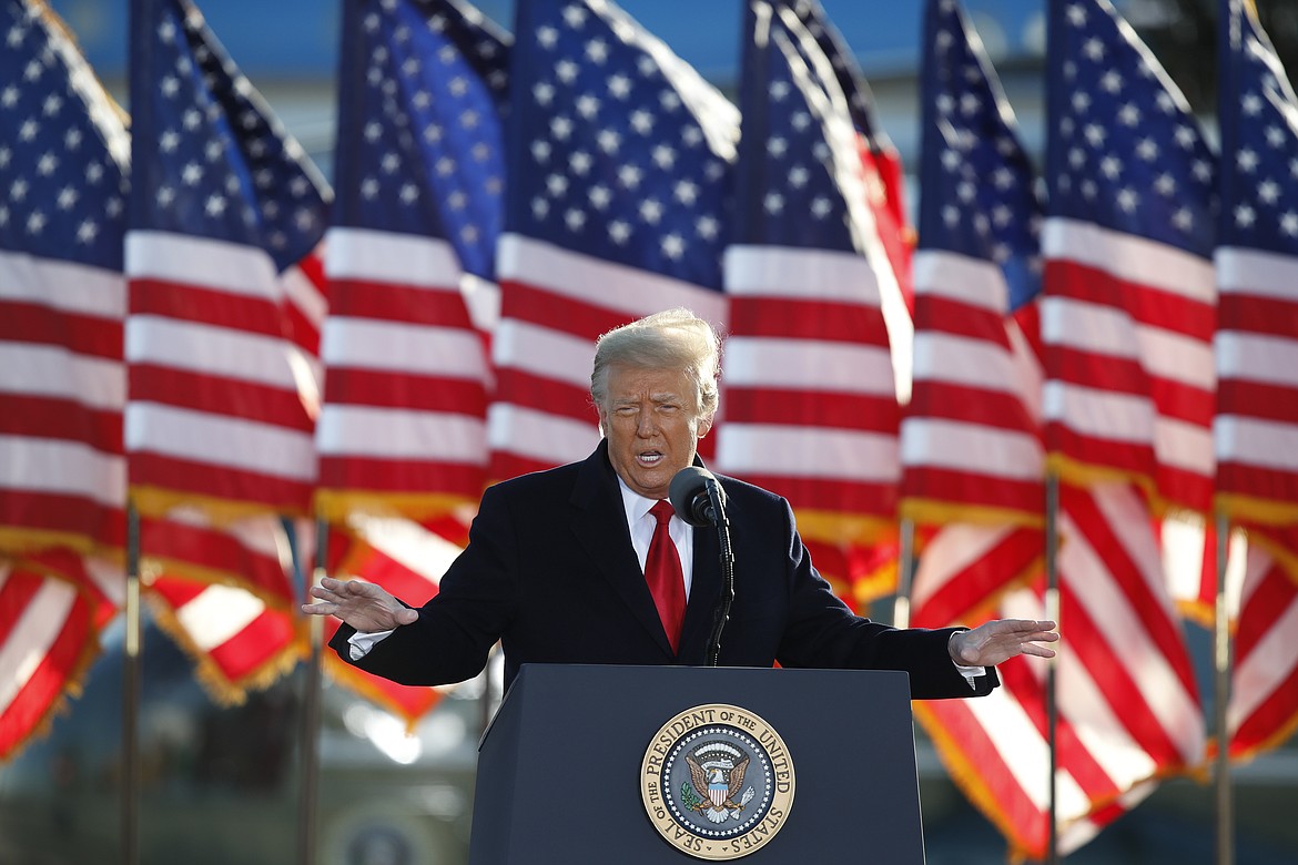 President Donald Trump speaks to crowd before boarding Air Force One at Andrews Air Force Base, Md., in this Wednesday, Jan. 20, 2021, file photo. Former President Donald Trump will find out this week whether he gets to return to Facebook. The social network’s quasi-independent Oversight Board says it will announce its decision Wednesday, May 5 on a case concerning the former president. Trump's account was suspended for inciting violence that led to the deadly Jan. 6 Capitol riots.