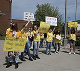 Protesters show support for ousted NIC professor