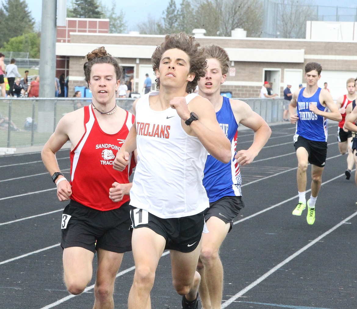 JASON ELLIOTT/Press 
Post Falls senior Alex Peters, Sandpoint's Jett Lucas and Braden Dance of Coeur d'Alene complete the first lap of the boys 800 during the District 1 All-Star Meet on Thursday at Post Falls High