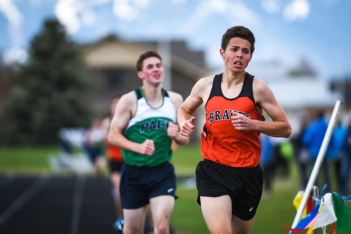 Flathead's Gabe Felton leads the boys 1600 meter run during a crosstown meet with Glacier at Glacier High School on Friday. (Casey Kreider/Daily Inter Lake)