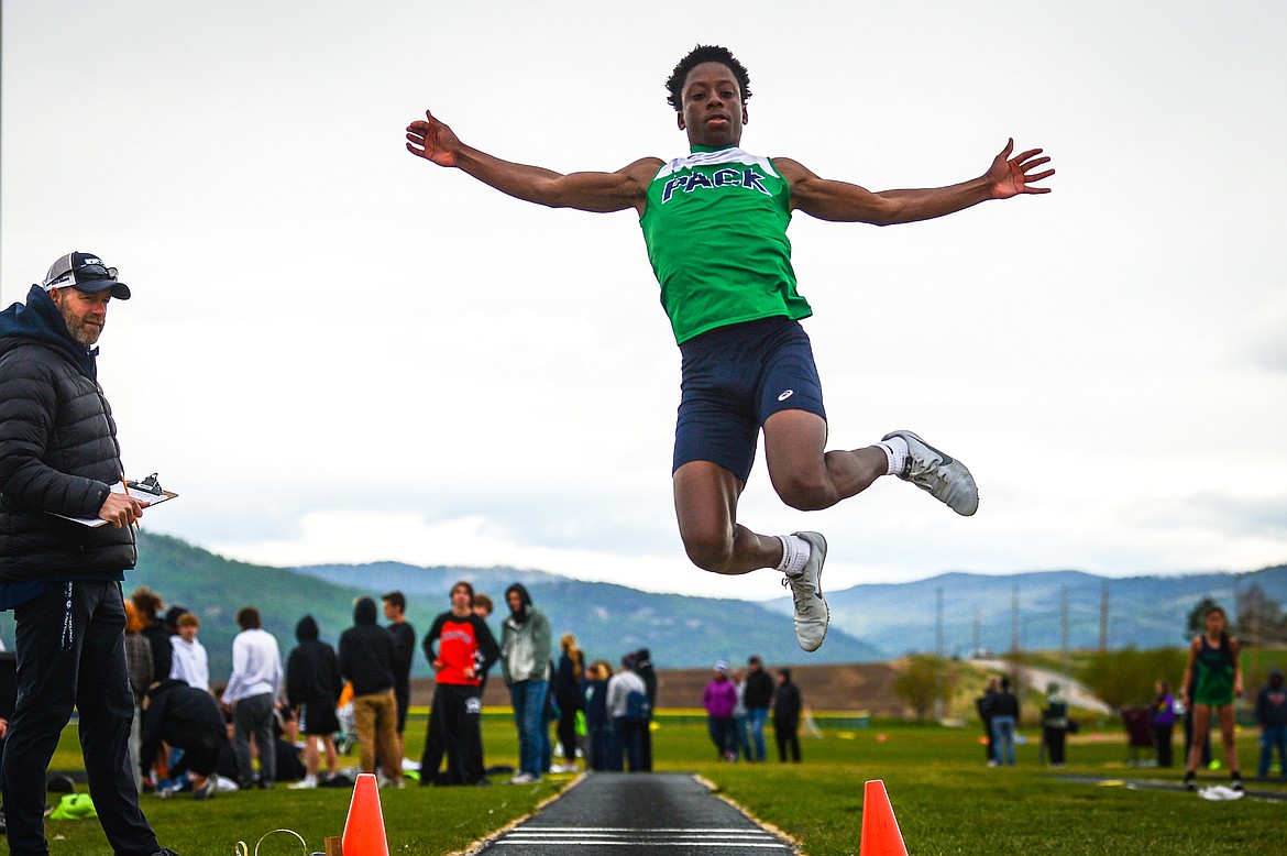 Glacier's Jeff Lillard competes in the long jump during a crosstown track meet with Flathead at Glacier High School on Friday. (Casey Kreider/Daily Inter Lake)