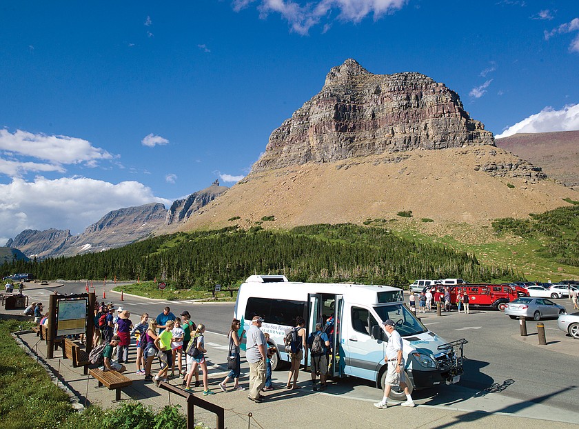 Folks board the shuttle at Logan Pass in this file photo.