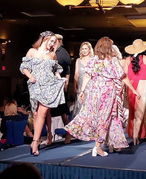 Models walk the runway during the 3Cs Fashion Show in The Coeur d'Alene Resort on Thursday night.