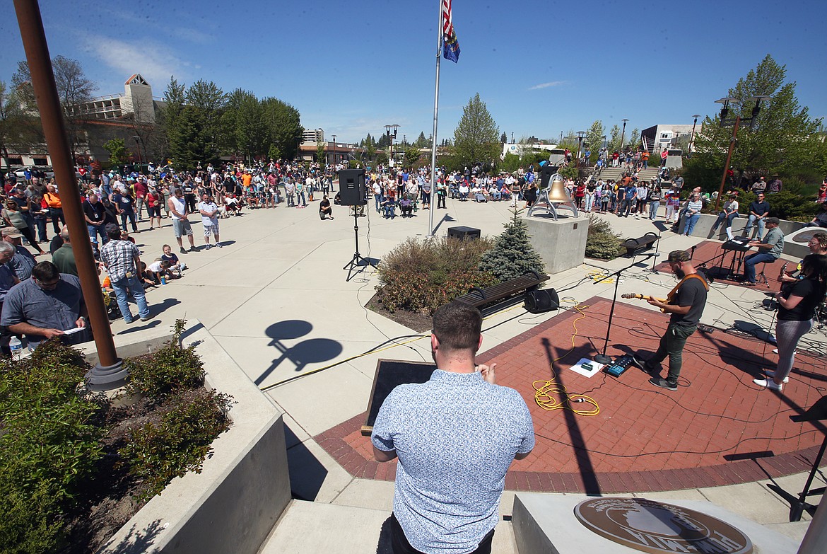 Pastor Geoffrey Winkler of New Life Church addresses the crowd during the National Day of Prayer gathering in Coeur d'Alene on Thursday.