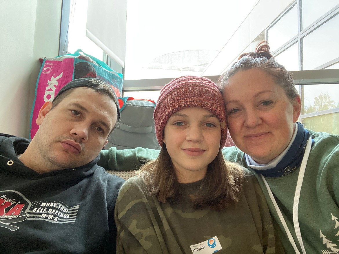 Photo courtesy JENNY WHALEY
From left, Matt Whaley, daughter Casey and wife Jenny at the hospital in Seattle the night before Casey's kidney transplant in November.