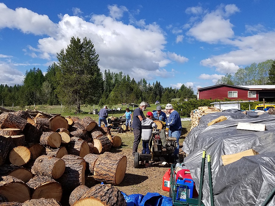 Firewood Rescue volunteers are hard at work getting wood ready for when they hear about someone in need of wood to keep their home warm.