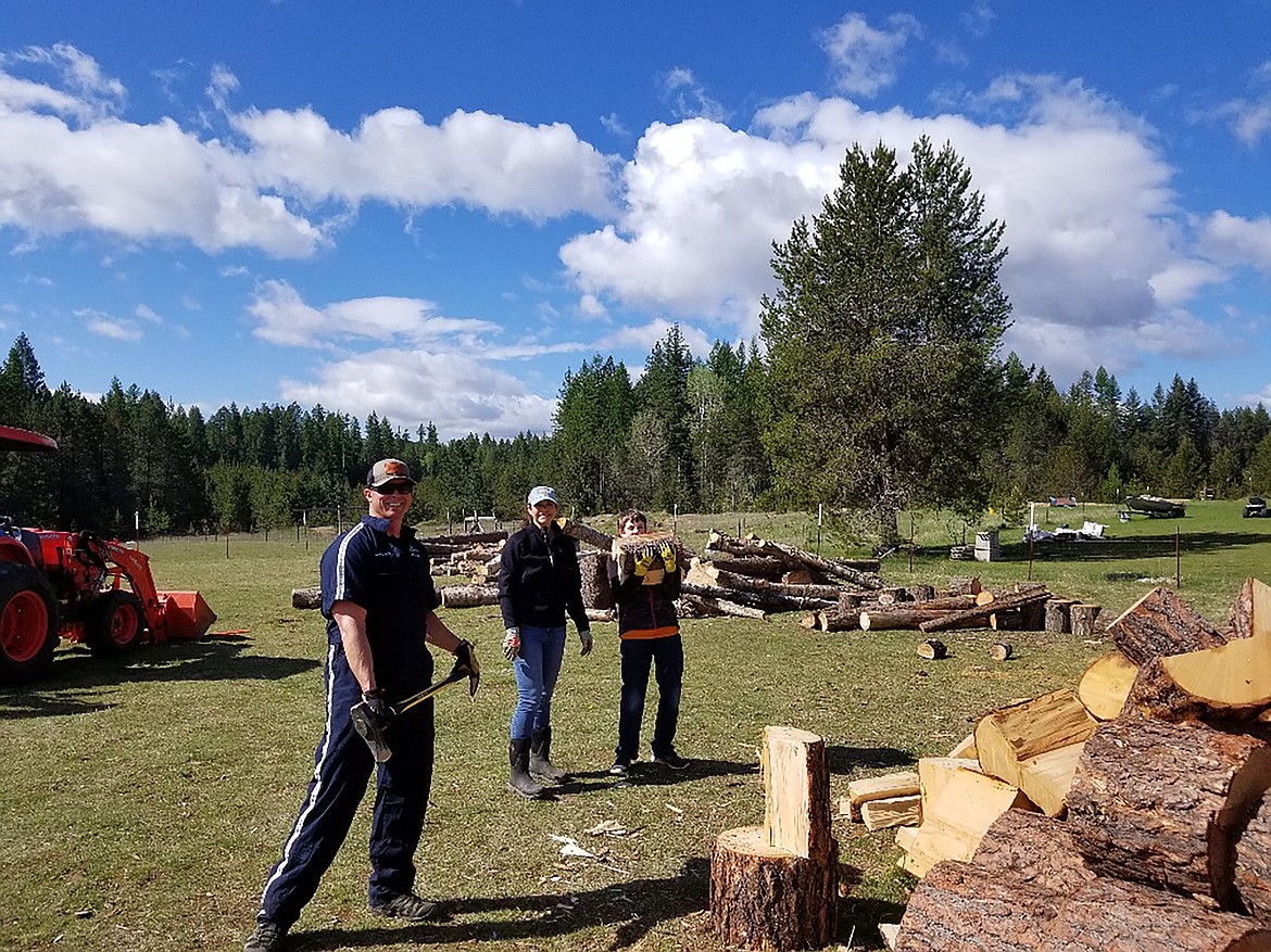 Firewood Rescue volunteers are hard at work getting wood ready for when they hear about someone in need of wood to keep their home warm.