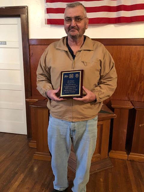 Vietnam veteran Ed Heppe shows off his Life Member plaque he recently received at the Veterans of Foreign Wars in Superior. (Photo courtesy Jim DeBree)