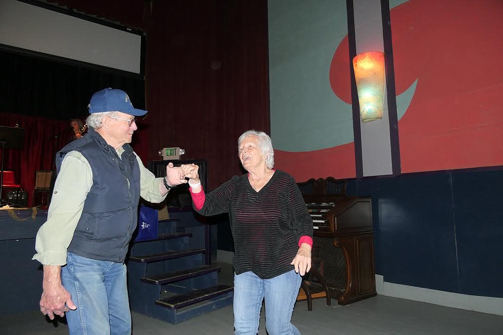 Keith Caldwell and Connie Scott cut a rug Friday night at the Rex Theater during the Cancer Network of Sanders County’s fundraiser. (Adam Lindsay/Valley Press)