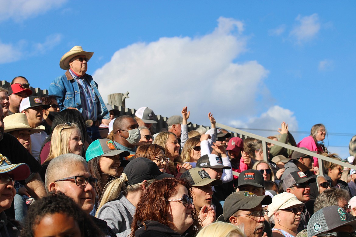 Fans cheer at the 64th Colorama Rodeo in Grand Coulee Saturday.