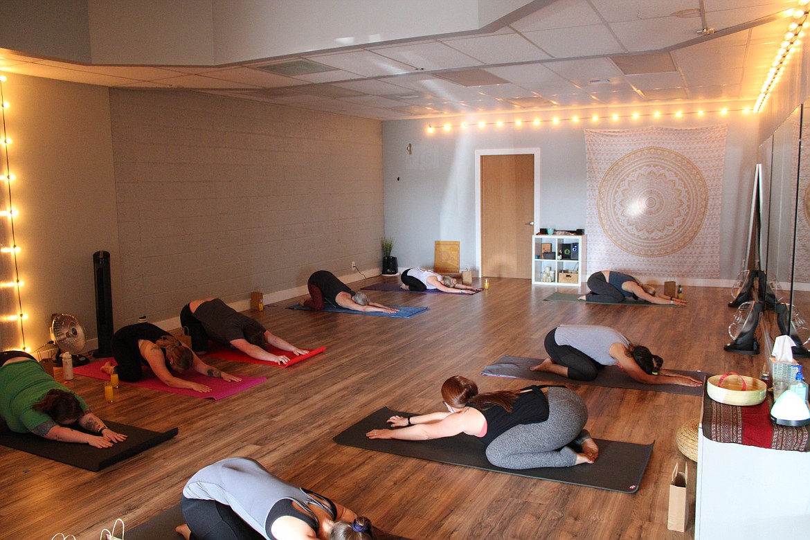 Mothers and friends warm up before the "Mothers & Mimosas" event at O2 Studios in Moses Lake on Sunday.