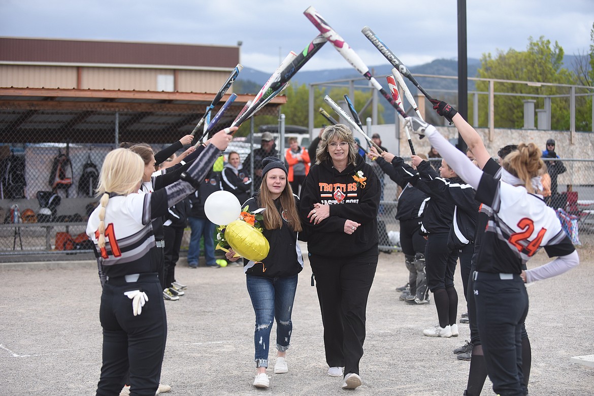 Plains-Hot Springs manager Dacia Black and her family enjoy Senior Night. (Scott Shindledecker/Valley Press)