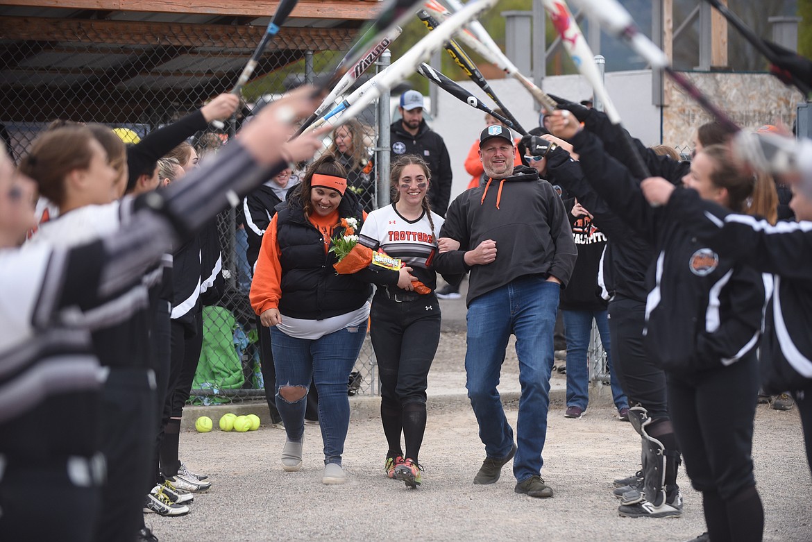 Plains-Hot Springs softball player Mykenzie Blood and her family enjoy Senior Night. (Scott Shindledecker/Valley Press)