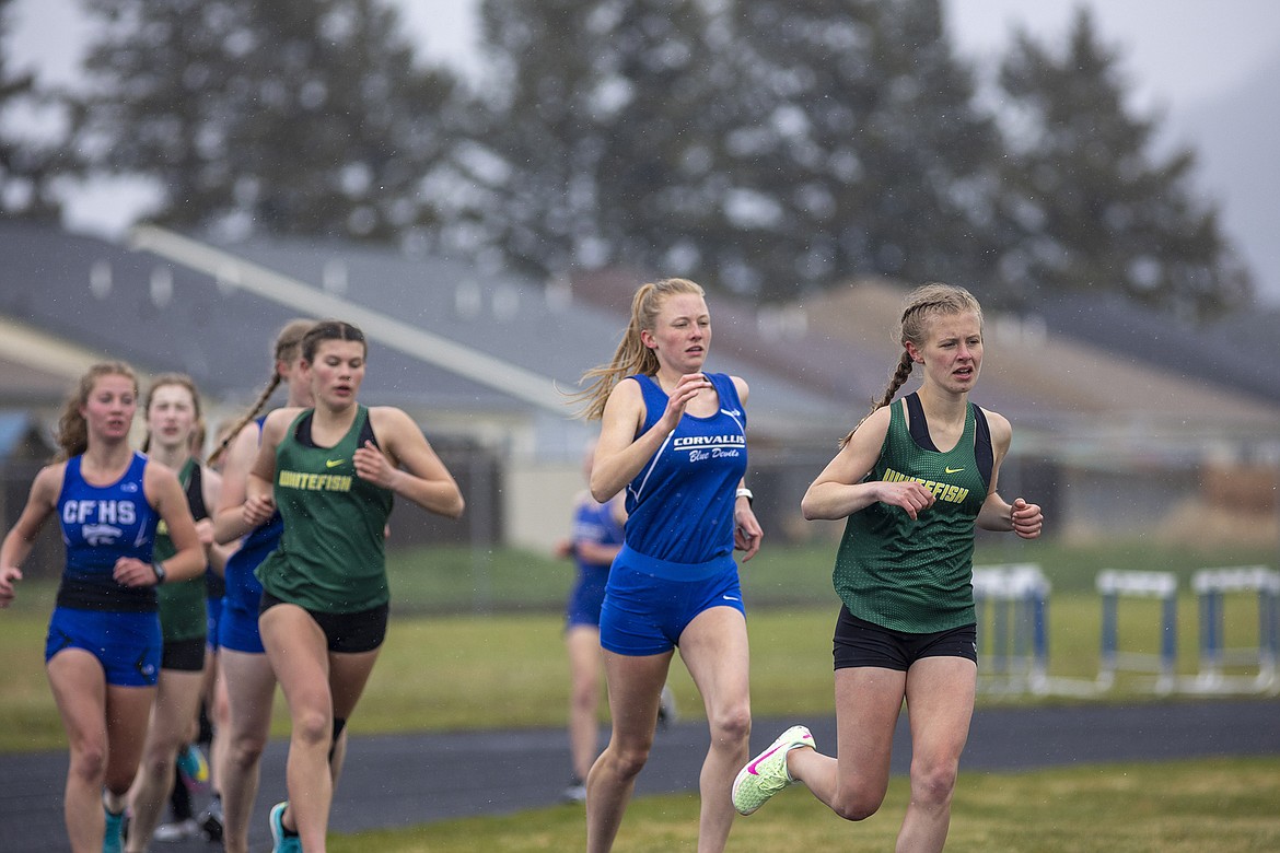 Whitefish freshman Morgan Grube runs the mile at the Columbia Falls Invite on Saturday. (Chris Peterson/Hungry Horse News)