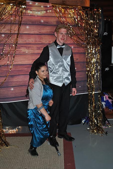 All glammed up in the photo area, Grace Marie McGuffey poses with her date William Lowry at the St. Regis prom last week. (Amy Quinlivan/Mineral Independent)