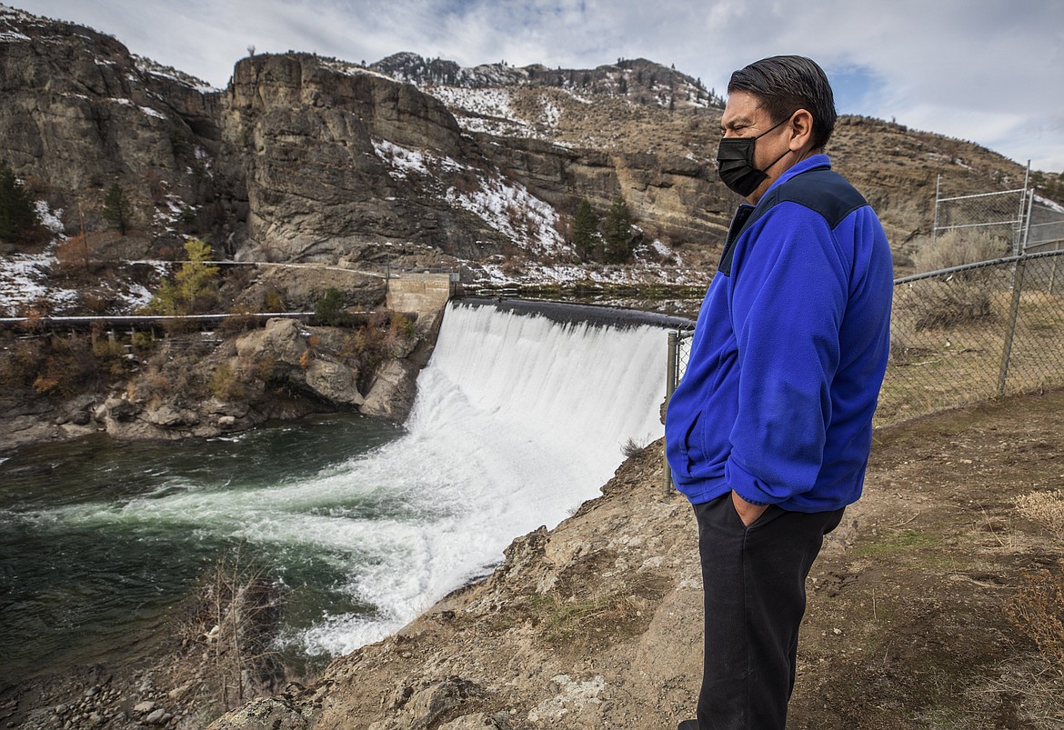 In this Oct. 28, 2020, file photo, Rodney Cawston, chairman of the Colville tribe business council, stands in Oroville, Wash., at the site of the Enloe Dam, which the tribe wants removed because it blocks fish from reaching the Similkameen River. It's been 50 years since the Confederated Tribes of the Colville Reservation voted against termination, effectively ending the federal government's experiment in abrogating treaties, eliminating funding and "freeing the Indians" from the Bureau of Indian Affairs. More than 100 tribes were terminated by the United States — but not one after the 12 bands that make up the reservation in Washington state crushed the idea at the ballot box.