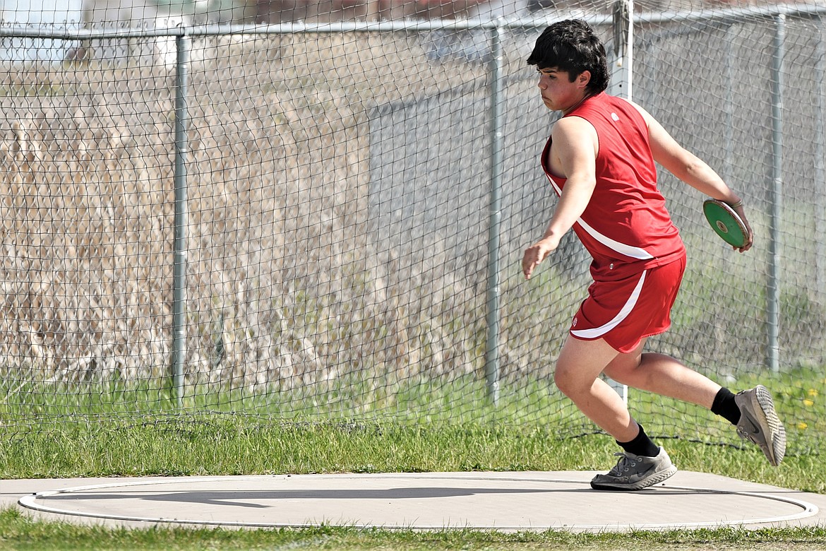 Garrett O'Conner of Arlee prepares to launch the discus Thursday at Ronan. (Scot Heisel/Lake County Leader)