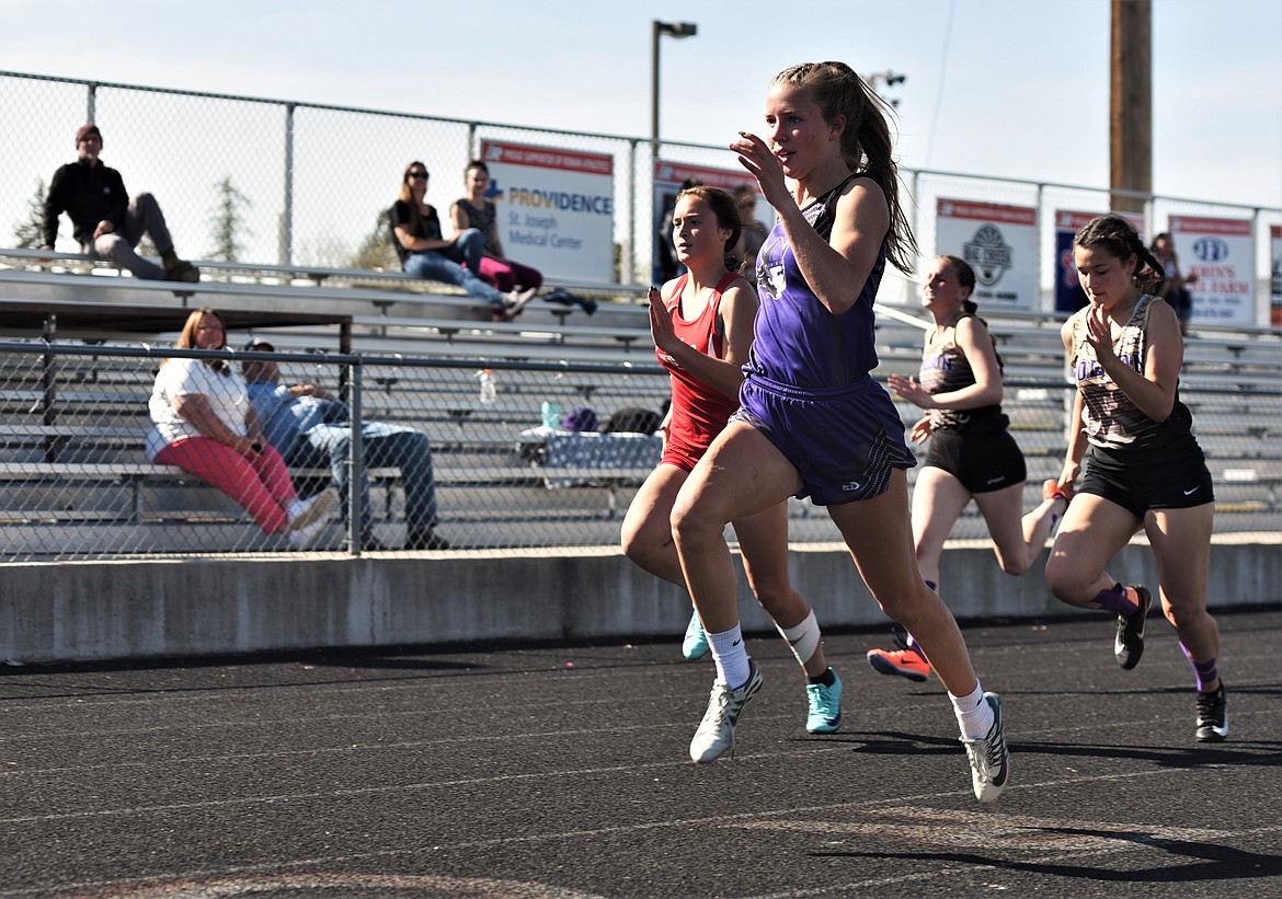 Charlo's Carlee Fryberger leads the field during the girls 100 meters Thursday at Ronan. (Scot Heisel/Lake County Leader)