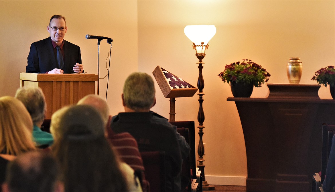 Chris Holien speaks during a memorial service for his father, longtime radio personality and Polson resident Mick Holien, Saturday at The Lake Funeral Home and Crematory in Polson. (Scot Heisel/Lake County Leader)