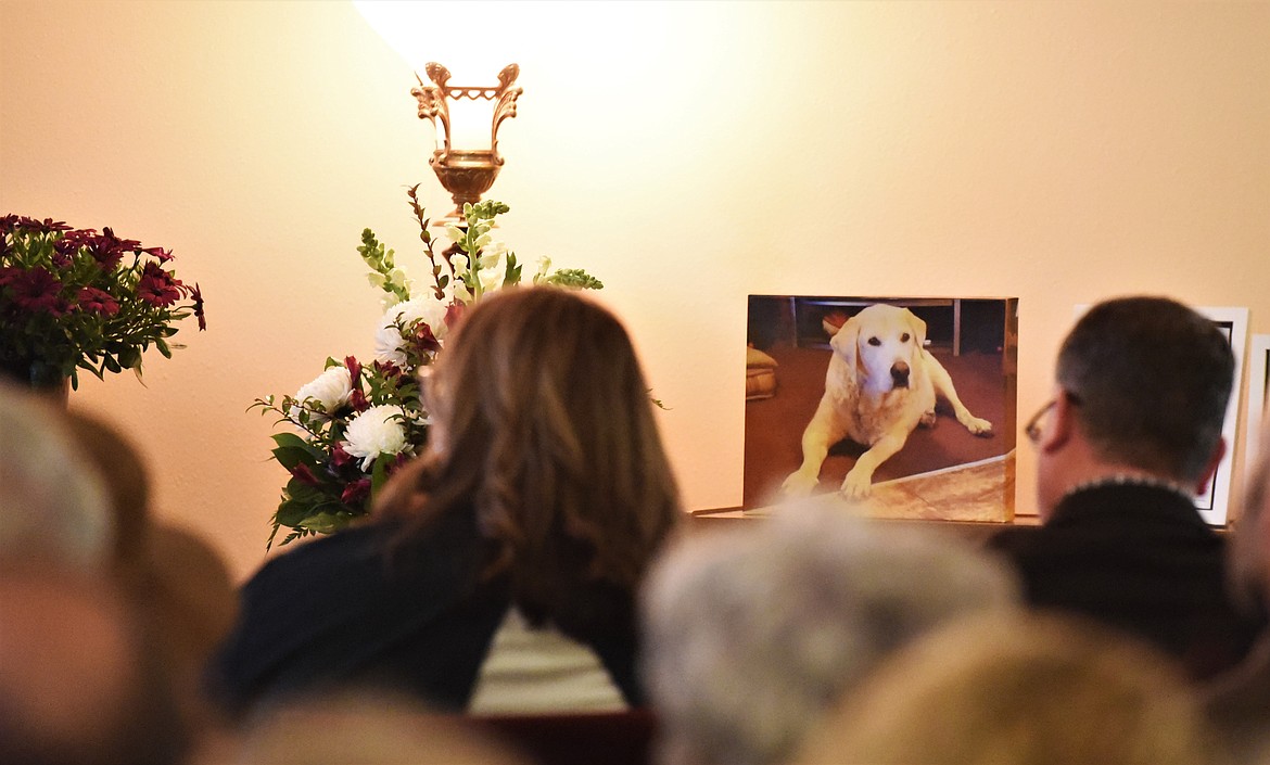 A photo of Mick Holien's dog Skyy greeted those who attended his memorial service in Polson. (Scot Heisel/Lake County Leader)