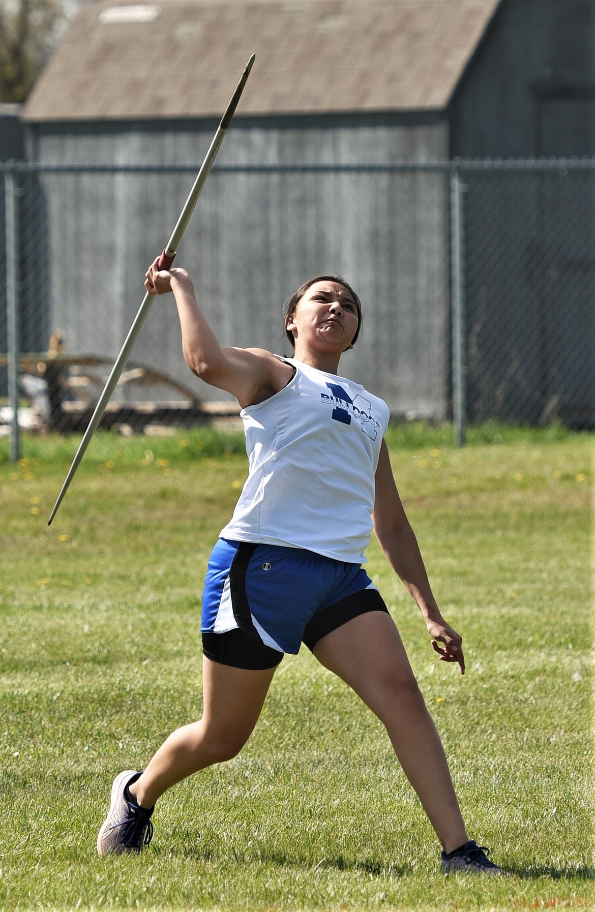 Mission freshman Jordann Singer launches the javelin Thursday during the Lake County meet at Ronan. (Scot Heisel/Lake County Leader)