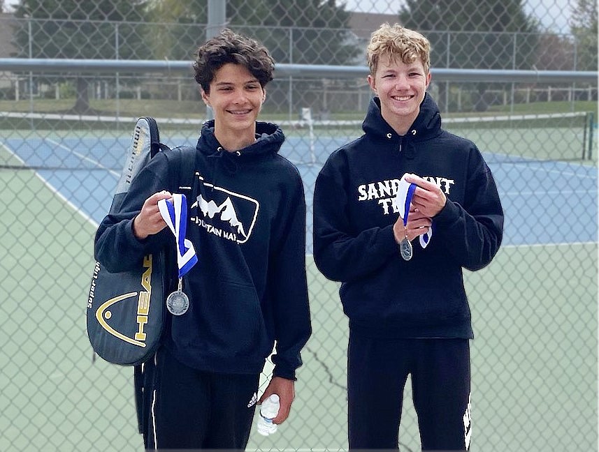 Noah Spinney (left) and Owen Larson pose for a photo on Saturday.