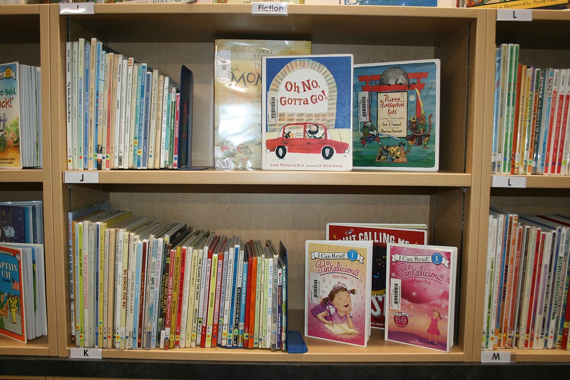 Books sit on the shelf in the Red Rock Elementary School library.
