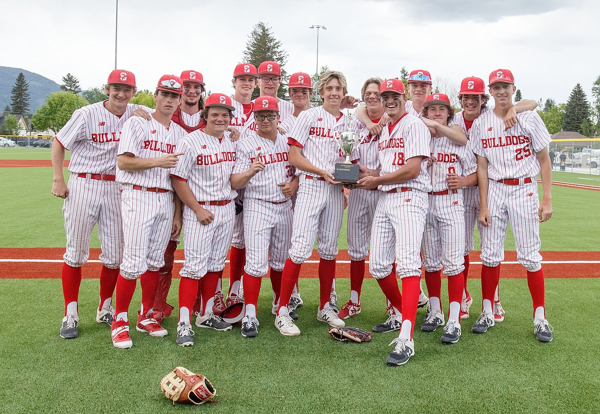 The Sandpoint baseball team poses for a photo with the regional trophy following Wednesday's win.