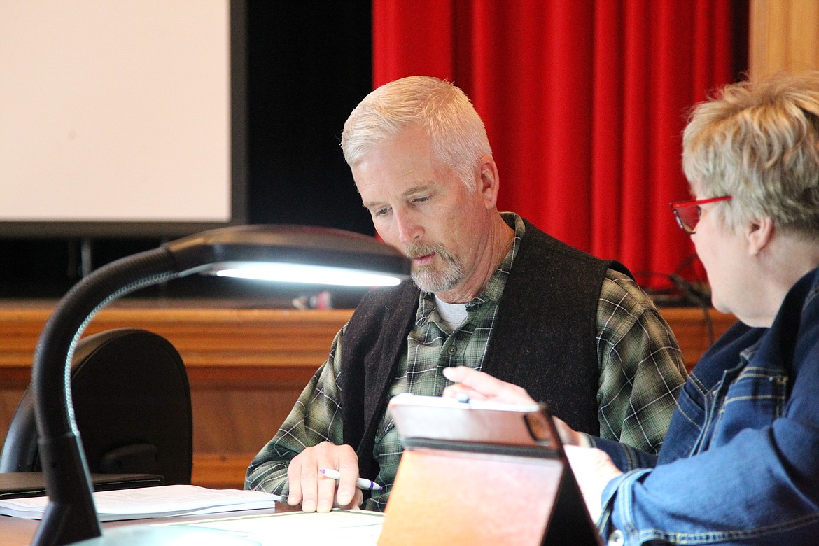 Rob Delmas takes his seat on the Libby Public Schools Board after taking his oath of office on May 10. Delmas ran unopposed for the position after Jeff Stevenson and Ellen Johnston opted not to run for reelection. (Will Langhorne/The Western News)