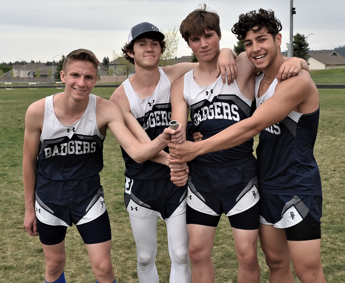 (Photo courtesy of Maureen Blackmore) 
Pictured: Daniel Walker, Ian Beazer, Willy Wall and Hayden Stockton after breaking the previous 4x400m school record.